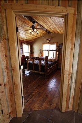 wood flooring, wood paneling, trim, and molding.