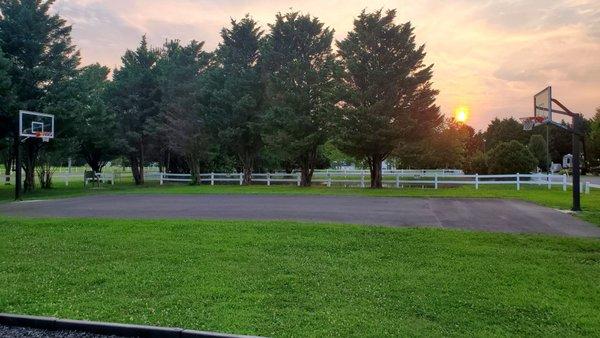 Basketball court. Nicely paved but no markings