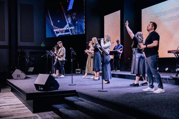 A view of the stage and worship team.