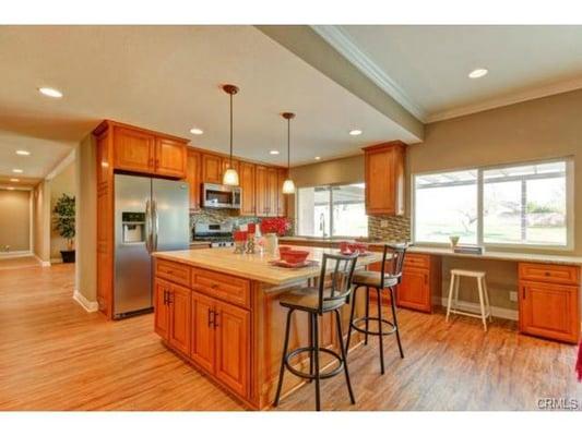 Remodeled Kitchen in 1st Ave Upland. Taking the wall down between the kitchen and family room really opened up the space.