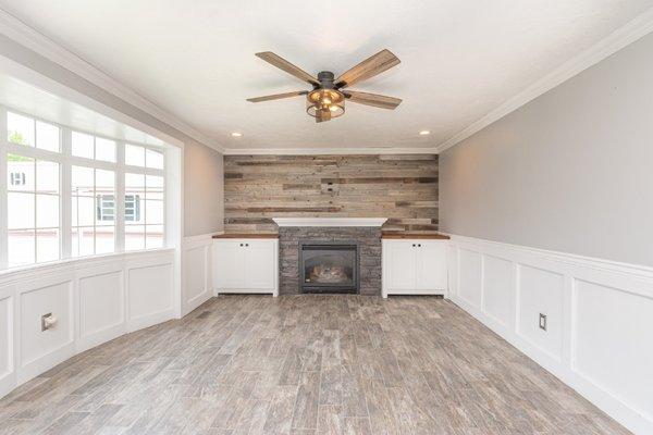 Remodeled living room and fireplace with custom built cabinets