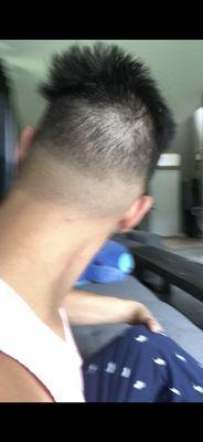 I told the guy to give me a low bald fade. This is what I ended up with. It's not even blended in