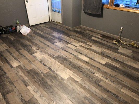 A beautiful vinyl flooring with pre-installed underlayment. This floor not only looks good but feels good!