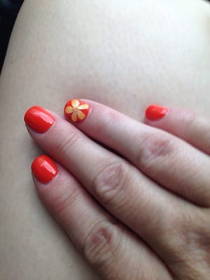 Orange gel nail with flower :)