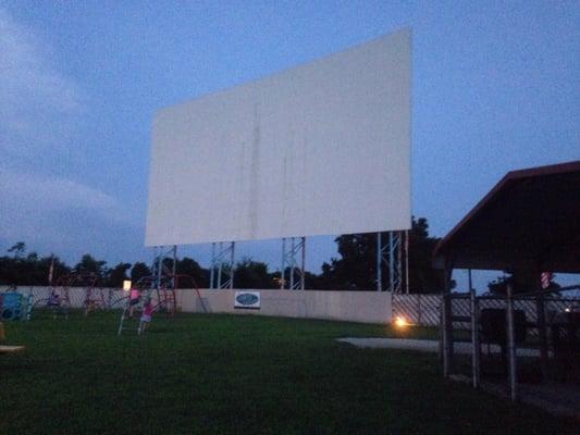 Waiting for the movie to start.