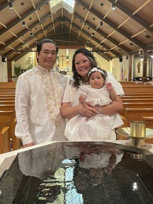 By the baptismal font