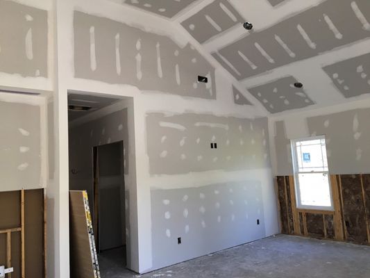 Sheetrock installation in progress