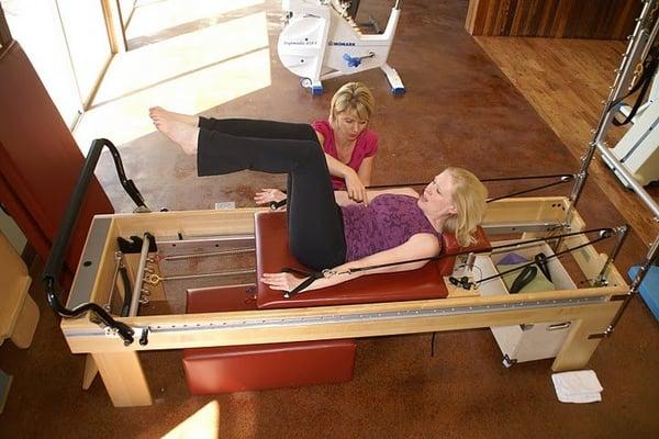 Pilates instructor Heather Brodie-Visser working with a client.