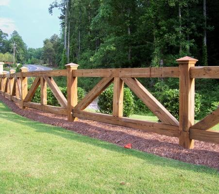 Wood horse fence by Mossy Oak Fence