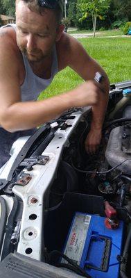 Paul working on an Acura