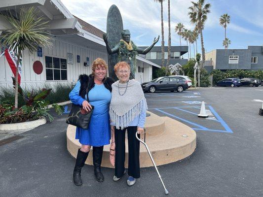 My mother's outfit from Panache:  pants, baby blue sweater, matching blue necklace, and cape with fringe. She looks stunning.