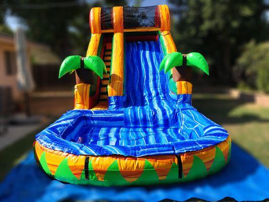 Our beautiful tropical water slide 14' is an ideal fit for your backyard. Have bigger backyard? go for our 16'+ Water Slides.  #waterslide