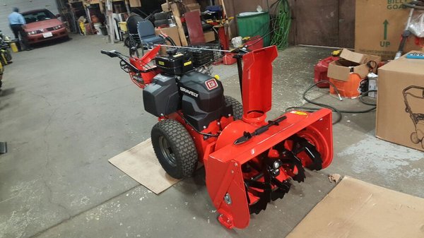 The new gravely qxt. Two wheel tractor with snow blower