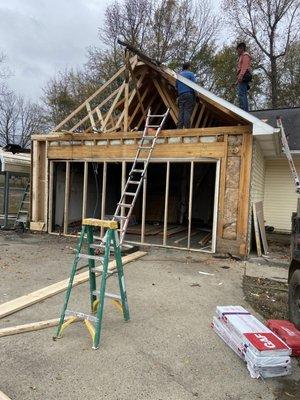 Crew working on the roofs frame