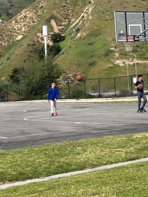 My brother made a new friend at the basketball court! :)