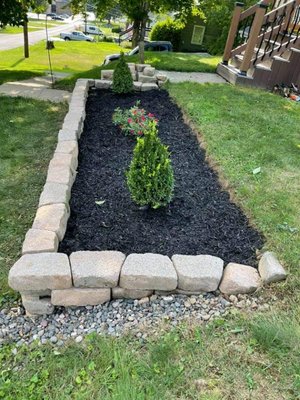 Landscaping, mulch, stone, flowers, shrubs, small trees