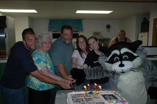 40th Anniversary  Celebration, with John Baker, Anne Baker (founder), Jack and Maureen Baker (owners), Monica and Reds Raccoon!