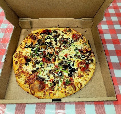 Large Supreme Pizza made with fresh ingredients