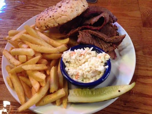 Brisket sandwich. I took a bite of pickle before thinking to take this picture!