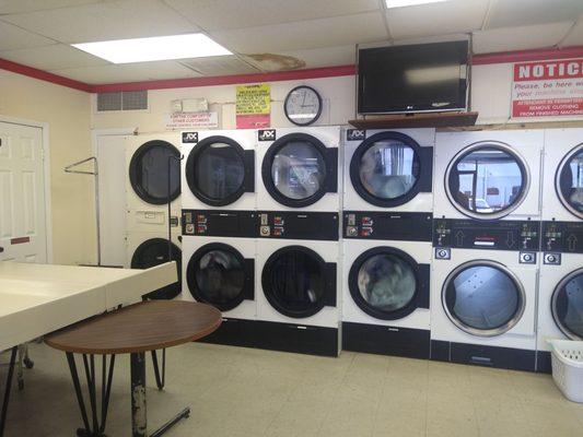 Wall of dryers- recommended to use $2 for large or bulky  loads