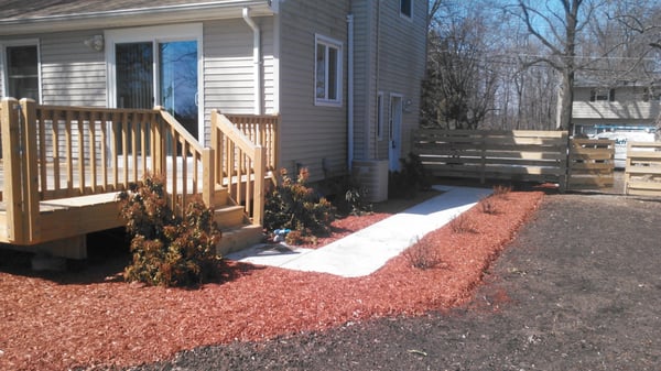 New sidewalk and fence