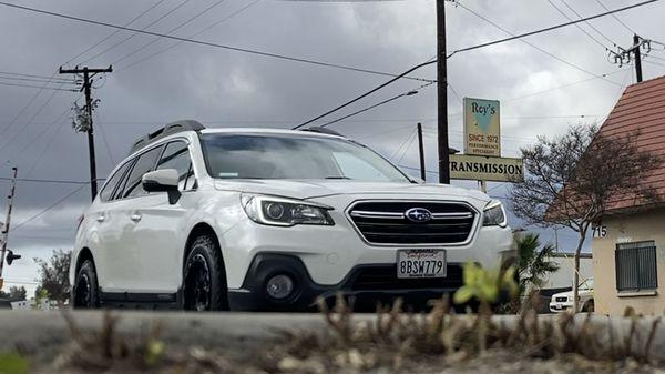 2018 Subaru Outback with black KMC wheels & BFG All Terrain tires