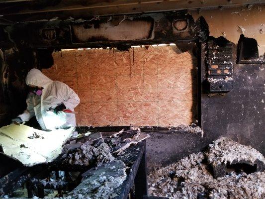 Furniture covered with soot in fire damaged home. Doing some asbestos testing.