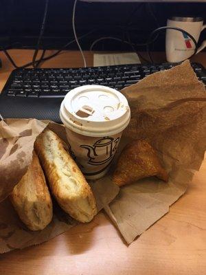 Veggie puffs, chai, and veggie samosa.