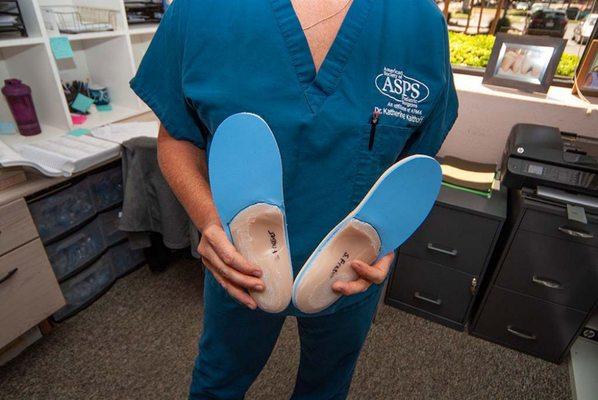 Old fashioned hand made orthotics (custom arch supports) for superior comfort and performance.