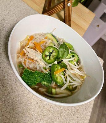 Chicken pho with beef broth and steamed veggies.