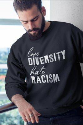 Diversity is a powerful and amazing thing. Our Love Diversity Hate Racism Sweatshirt draws a line between love and hate.