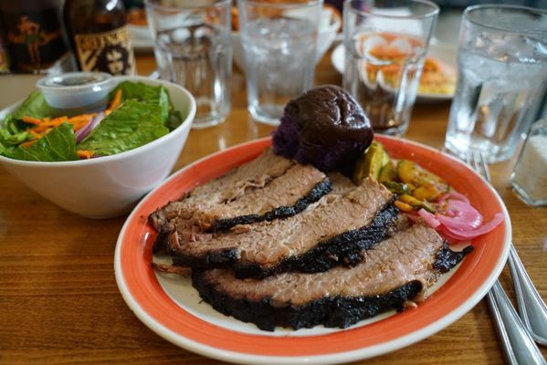 Brisket with a side salad (fresh leaves and carrots!), comes with a PURPLE roll and pickled red onions, spicy pickles