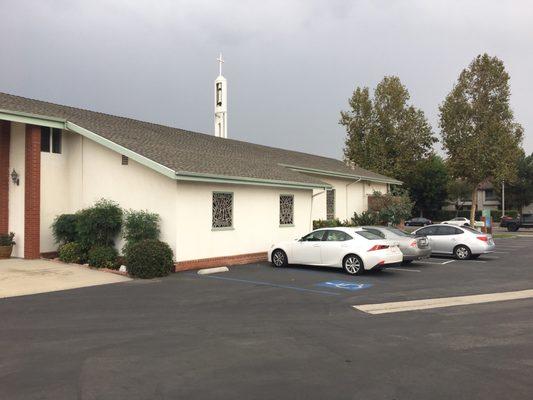 The building is 9 parking spots long.