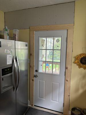 New exterior door was an 84" in height framed in for standard size 32" by  79" ext door.