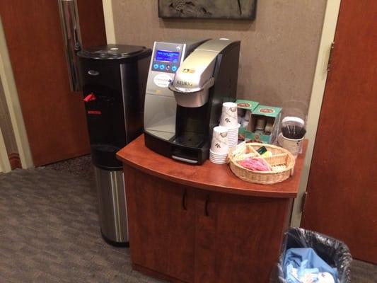 Free coffee while you wait on squishy chairs! Nice touch.