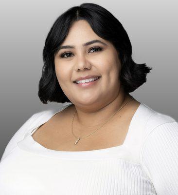 A professional headshot of Alejandra Ayala