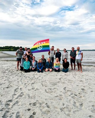 Yoga on the beach to kick off Newports first gay pride weekend!