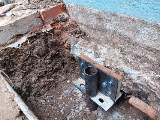 Slab Foundation Repair via Push Pier