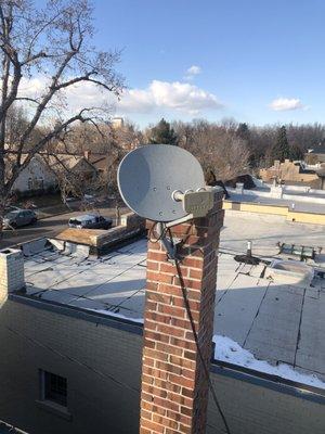 Old satellite dish removal including coax cable