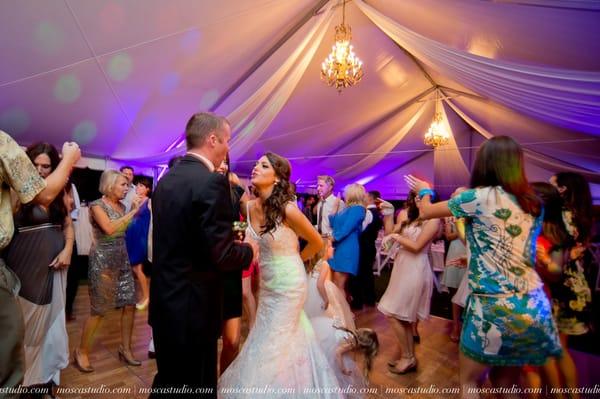 Dance the night away with a gorgeous tent, lights, and elegant chandeliers.