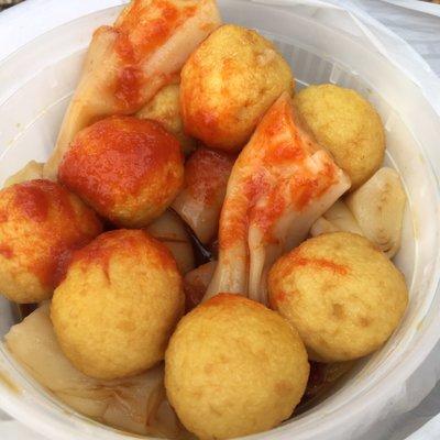 Curry fish ball rice noodle with soy sauce and sriracha