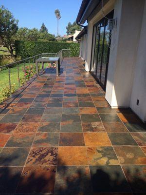 Enhancing sealer applied to slate