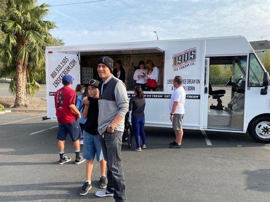 Employees.  Ice cream truck.