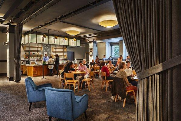 Patrons enjoying a refreshing drink in the Otto Bar located in the Forum.