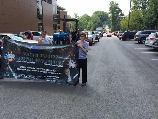 Some of our students with the float in the 4th of July parade, Demorest, Georgia!