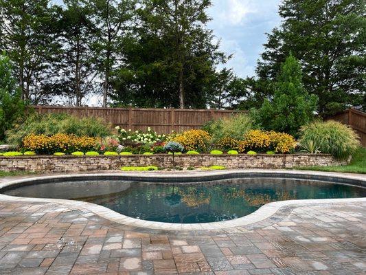 Pool patio landscape retaining wall