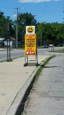 Welcome sign near roadway!