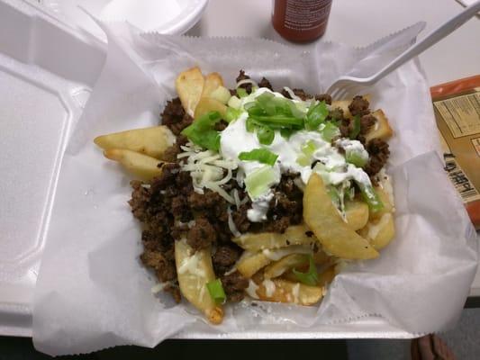 Steak fries - actually made with seasoned ground beef but very tasty. Toppings piled on!