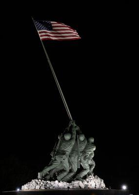 Nighttime photo of the Iwo Jima Memorial at the Marine Military Academy in Harlingen, Texas.