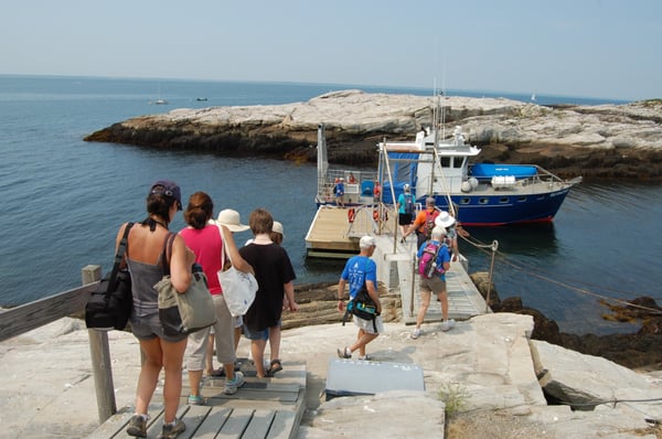 Passengers board the R/V Gulf Challenger after spending the day on Appledore Island.